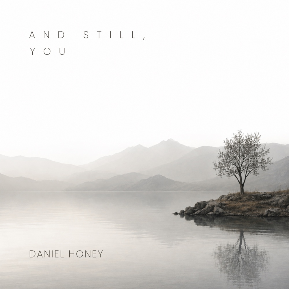 A lone tree beside a calm mountain lake, with the title And Still, You and Daniel Honey’s name.